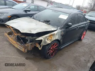 2014 Mitsubishi Lancer GT with VIN JA32U8FW9EU010127, listed as a IAAI auction lot 41182463 with Not Provided miles and . Bid and sale history available at DreamBid. Image 2.