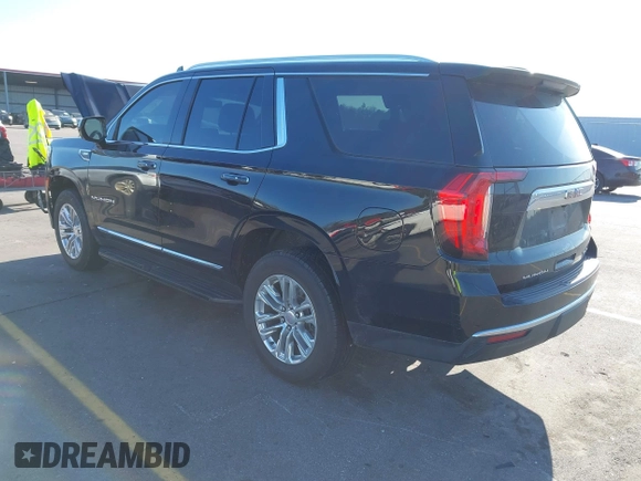 2021 GMC Yukon SLT with VIN 1GKS1BKD0MR199154, listed as a IAAI auction lot 41654239 with 105,357 mi miles. Bid and sale history available at carsss.com. Image 3.