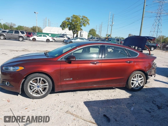 2016 Ford Fusion Titanium Hybrid with VIN 3FA6P0RU8GR127140, listed as a IAAI auction lot 41750405 with 110,861 mi miles. Bid and sale history available at carsss.com. Image 15.