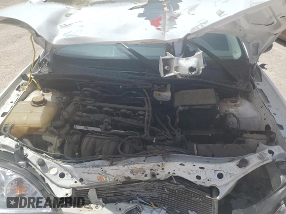 2007 Ford Focus S z VIN 1FAFP34N27W186716, wystawiony jako Copart lot #54894055 z przebiegiem 86 305 mil mil oraz Szkoda całkowita • Salvage title. Historia ofert i sprzedaży dostępna na DreamBid. Obrazek 11.