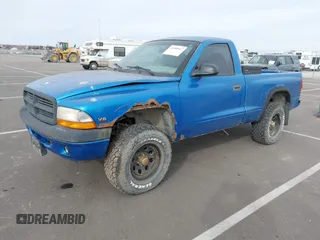 1999 Dodge Dakota with VIN 1B7GG26X5XS296142, listed as a IAAI auction lot 41486667 with 185,436 mi miles and . Bid and sale history available at carsss.com. Image 2.