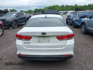 2018 Kia Optima S with VIN 5XXGT4L36JG265878, listed as a IAAI auction lot 42302801 with 101,927 mi miles and . Bid and sale history available at DreamBid. Image 17.
