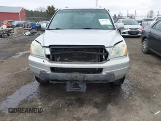 2005 Honda Pilot EX with VIN 5FNYF18455B064378, listed as a IAAI auction lot 41684465 with 248,225 mi miles and . Bid and sale history available at DreamBid. Image 6.