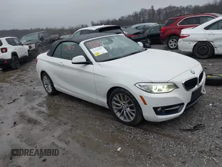 2016 BMW 2 Series 228i xDrive with VIN WBA1L9C59GV767802, listed as a IAAI auction lot 41132997 with 87,674 mi miles. Bid and sale history available at carsss.com. Image 1.