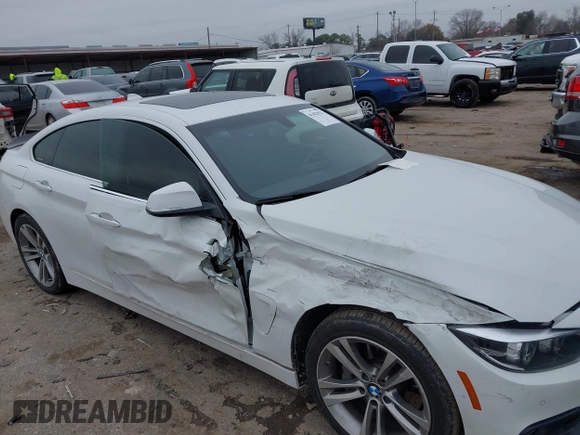 2018 BMW 4 Series 440i with VIN WBA4J5C56JBF07087, listed as a IAAI auction lot 41421921 with 61,601 mi miles and . Bid and sale history available at DreamBid. Image 6.