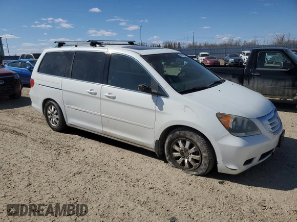 2009 Honda Odyssey EX-L with VIN 5FNRL38679B504312, listed as a Copart auction lot 53878465 with 239,462 mi miles and Salvage Title. Bid and sale history available at carsss.com. Image 4.