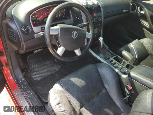 2006 Pontiac GTO z VIN 6G2VX12U76L820047, wystawiony jako Copart lot #48890995 z przebiegiem 182 891 mil mil oraz Czysty tytuł • Clean title. Historia ofert i sprzedaży dostępna na DreamBid. Obrazek 8.