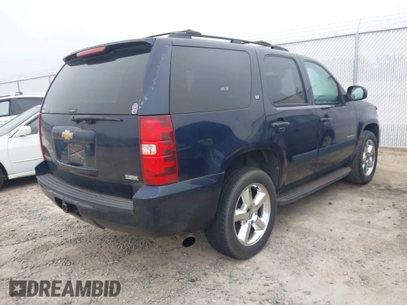 2007 Chevrolet Tahoe LT with VIN 1GNFC13067R417140, listed as a IAAI auction lot 42885810 with 243,470 mi miles and . Bid and sale history available at DreamBid. Image 4.