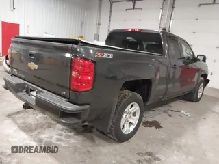 2016 Chevrolet Silverado 1500 LT with VIN 1GCVKREC0GZ303387, listed as a IAAI auction lot 41978237 with 123,692 mi miles and . Bid and sale history available at DreamBid. Image 4.
