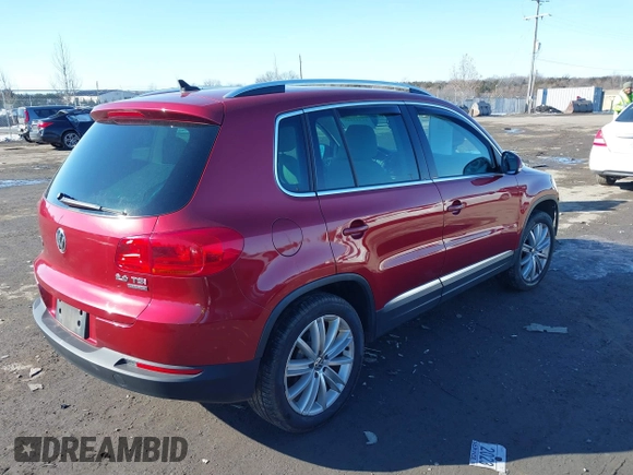 2012 Volkswagen Tiguan S with VIN WVGBV7AX2CW078629, listed as a IAAI auction lot 41332445 with 94,239 mi miles and . Bid and sale history available at DreamBid. Image 4.