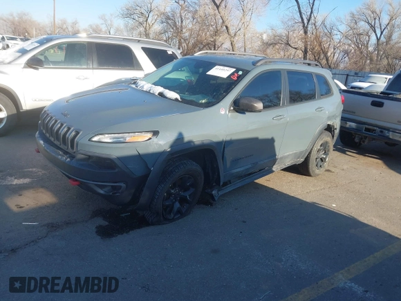 2015 Jeep Cherokee Trailhawk with VIN 1C4PJMBS3FW510219, listed as a IAAI auction lot 41440297 with 144,012 mi miles and . Bid and sale history available at DreamBid. Image 15.