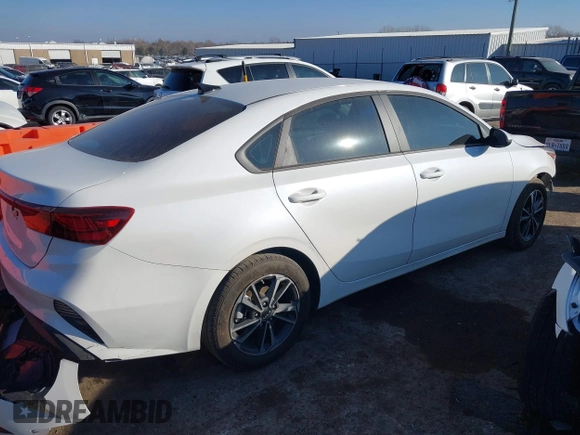 2024 Kia Forte LXS with VIN 3KPF24AD7RE818472, listed as a IAAI auction lot 41133832 with 4,107 mi miles and . Bid and sale history available at DreamBid. Image 4.