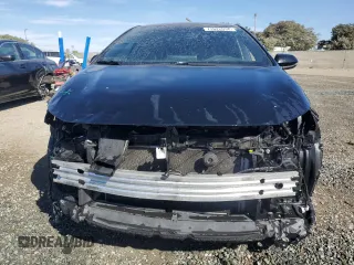 2021 Toyota Corolla Hatchback SE with VIN JTND4MBE4M3115822, listed as a Copart auction lot 77622034 with 83,268 mi miles and Salvage Title. Bid and sale history available at carsss.com. Image 5.
