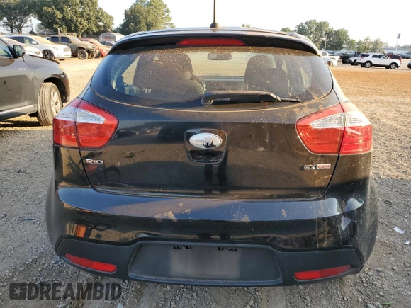 2014 Kia Rio EX with VIN KNADN5A34E6325423, listed as a Copart auction lot 69116324 with 104,083 mi miles and Salvage Title. Bid and sale history available at carsss.com. Image 6.