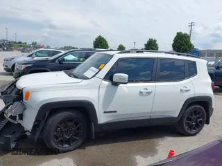 2019 Jeep Renegade Latitude z VIN ZACNJABB2KPK35081, wystawiony jako IAAI lot #42368128 z przebiegiem 94 908 mil mil oraz . Historia ofert i sprzedaży dostępna na DreamBid. Obrazek 14.