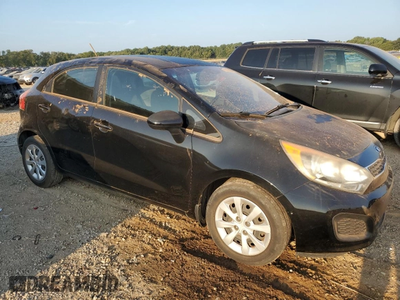 2014 Kia Rio EX with VIN KNADN5A34E6325423, listed as a Copart auction lot 69116324 with 104,083 mi miles and Salvage Title. Bid and sale history available at carsss.com. Image 4.