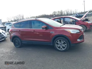 2015 Ford Escape Titanium with VIN 1FMCU9J91FUA26624, listed as a IAAI auction lot 40854175 with 132,313 mi miles. Bid and sale history available at carsss.com. Image 13.