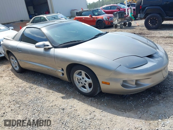 2002 Pontiac Firebird Firebird z VIN 2G2FS22K722105297, wystawiony jako IAAI lot #42350571 z przebiegiem 249 177 mil mil oraz . Historia ofert i sprzedaży dostępna na DreamBid. Obrazek 1.