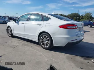 2019 Ford Fusion SE with VIN 3FA6P0H76KR261861, listed as a IAAI auction lot 41031650 with 132,040 mi miles. Bid and sale history available at carsss.com. Image 3.