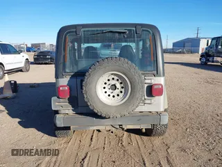 2001 Jeep Wrangler Sport with VIN 1J4FA49S91P324912, listed as a IAAI auction lot 41261214 with 260,299 mi miles. Bid and sale history available at carsss.com. Image 16.