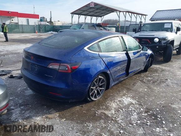 2018 Tesla Model 3 Long Range Battery with VIN 5YJ3E1EB8JF115138, listed as a IAAI auction lot 41343399 with 62,351 mi miles and . Bid and sale history available at DreamBid. Image 4.
