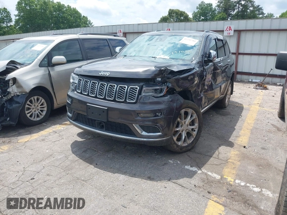 2020 Jeep Grand Cherokee Summit with VIN 1C4RJFJT0LC137054, listed as a IAAI auction lot 42235704 with 70,000 mi miles and . Bid and sale history available at DreamBid. Image 2.