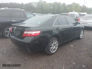 2007 Toyota Camry CE with VIN JTNBE46K573000686, listed as a IAAI auction lot 41971943 with 302,136 mi miles. Bid and sale history available at carsss.com. Image 4.
