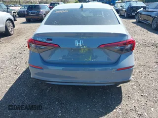 2024 Honda Civic EX z VIN 2HGFE1F74RH319661, wystawiony jako IAAI lot #42066326 z przebiegiem 34 629 mil mil oraz . Historia ofert i sprzedaży dostępna na DreamBid. Obrazek 16.