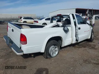 1998 Dodge Dakota SLT with VIN 1B7FL26X1WS716727, listed as a IAAI auction lot 41748963 with 1 mi miles. Bid and sale history available at carsss.com. Image 4.