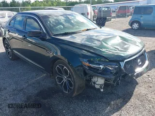 2013 Ford Taurus SHO z VIN 1FAHP2KT8DG173527, wystawiony jako IAAI lot #42198526 z przebiegiem 82 943 mil mil oraz . Historia ofert i sprzedaży dostępna na DreamBid. Obrazek 1.
