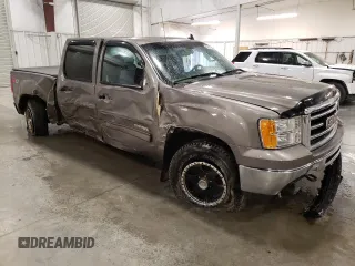 2012 GMC Sierra 1500 SLE with VIN 3GTP2VE73CG227453, listed as a Copart auction lot 52871865 with 133,419 mi miles and Salvage Title. Bid and sale history available at DreamBid. Image 4.