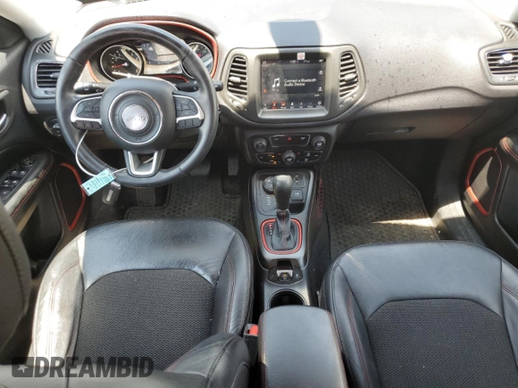 2017 Jeep Compass Trailhawk with VIN 3C4NJDDB1HT646751, listed as a Copart auction lot 62583555 with 99,974 mi miles and Salvage title. Bid and sale history available at DreamBid. Image 8.