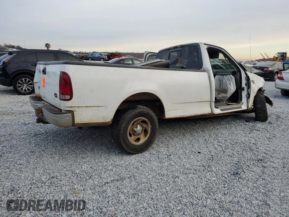 2000 Ford F-150 XL with VIN 2FTRF17L6YCA50613, listed as a Copart auction lot 83528344 with Not provided miles and Salvage title. Bid and sale history available at DreamBid. Image 3.