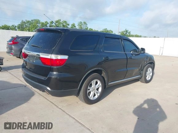 2012 Dodge Durango SXT with VIN 1C4RDJAG7CC293167, listed as a IAAI auction lot 42446634 with 140,182 mi miles and . Bid and sale history available at DreamBid. Image 4.