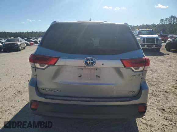 2018 Toyota Highlander Hybrid XLE with VIN 5TDJGRFH9JS045034, listed as a Copart auction lot 81771394 with 106,504 mi miles and Salvage title. Bid and sale history available at DreamBid. Image 6.