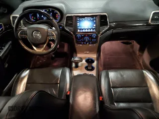 2015 Jeep Grand Cherokee Overland with VIN 1C4RJFCG7FC911899, listed as a Copart auction lot 54123925 with 243,031 mi miles and Salvage Title. Bid and sale history available at carsss.com. Image 8.