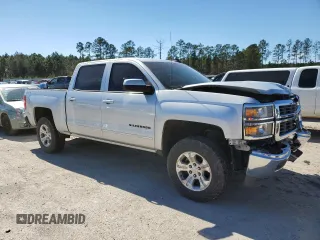 2015 Chevrolet Silverado 1500 LT with VIN 3GCUKREC0FG476093, listed as a Copart auction lot 48015305 with 132,092 mi miles and Salvage Title. Bid and sale history available at DreamBid. Image 4.