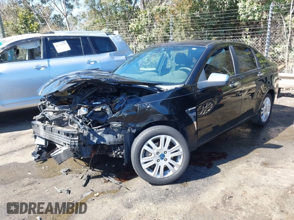 2008 Ford Focus SE with VIN 1FAHP35N88W218397, listed as a IAAI auction lot 41758730 with 192,732 mi miles. Bid and sale history available at carsss.com. Image 2.