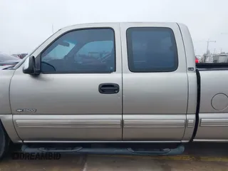 2000 Chevrolet Silverado 1500 with VIN 2GCEC19WXY1357051, listed as a IAAI auction lot 41535946 with 154,163 mi miles and . Bid and sale history available at DreamBid. Image 14.