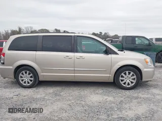 2016 Chrysler Town & Country Touring with VIN 2C4RC1BG1GR205535, listed as a IAAI auction lot 41183078 with 99,968 mi miles and . Bid and sale history available at DreamBid. Image 14.
