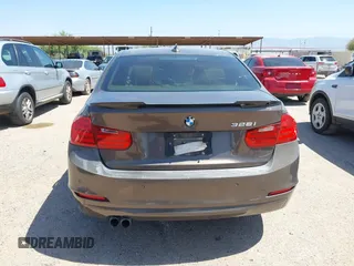 2015 BMW 3 Series 328i with VIN WBA3A5C51FF608143, listed as a IAAI auction lot 42387613 with 92,964 mi miles and . Bid and sale history available at DreamBid. Image 16.