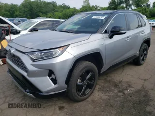2021 Toyota RAV4 Hybrid XSE with VIN 4T3E6RFVXMU039871, listed as a Copart auction lot 61654295 with 30,775 mi miles and Salvage title. Bid and sale history available at DreamBid. Image 1.