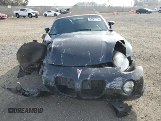 2007 Pontiac Solstice z VIN 1G2MB35B97Y117728, wystawiony jako Copart lot #87267724 z przebiegiem Nie podano mil oraz Szkoda całkowita • Salvage title. Historia ofert i sprzedaży dostępna na DreamBid. Obrazek 5.