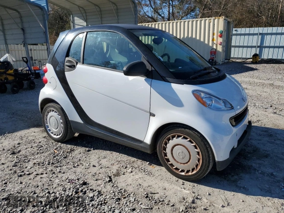 2012 Smart fortwo Pure z VIN WMEEJ3BA1CK559092, wystawiony jako Copart lot #85506924 z przebiegiem 47 806 mil mil oraz Szkoda całkowita • Salvage title. Historia ofert i sprzedaży dostępna na DreamBid. Obrazek 4.