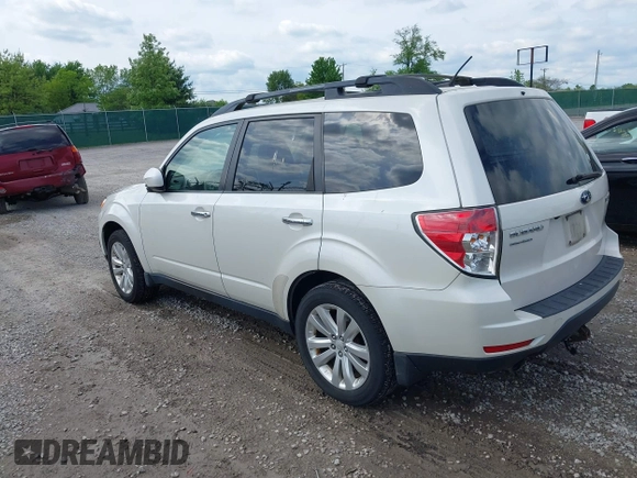 2013 Subaru Forester X Limited with VIN JF2SHAEC9DH401677, listed as a IAAI auction lot 42072338 with 288,909 mi miles and . Bid and sale history available at DreamBid. Image 3.