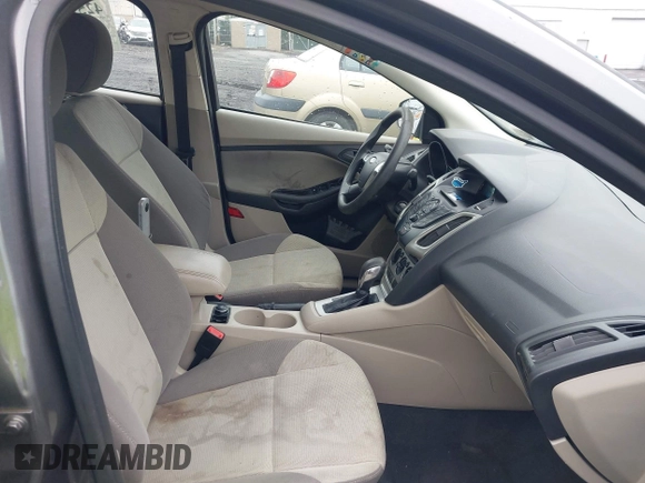 2012 Ford Focus SE z VIN 1FAHP3F29CL442731, wystawiony jako IAAI lot #42517796 z przebiegiem 148 728 mil mil oraz . Historia ofert i sprzedaży dostępna na DreamBid. Obrazek 5.