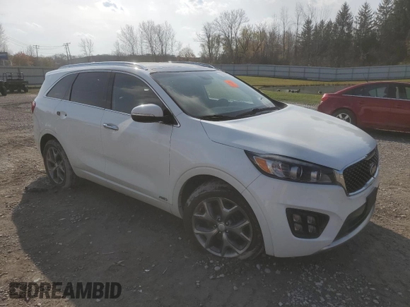 2016 Kia Sorento SXL z VIN 5XYPKDA16GG102852, wystawiony jako Copart lot #75659454 z przebiegiem Nie podano mil oraz Nie do naprawy • Non repairable. Historia ofert i sprzedaży dostępna na DreamBid. Obrazek 4.