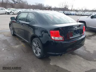 2012 Scion tC with VIN JTKJF5C72C3024241, listed as a IAAI auction lot 41750123 with 136,695 mi miles. Bid and sale history available at carsss.com. Image 3.