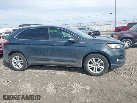 2019 Ford Edge SEL z VIN 2FMPK4J9XKBC58603, wystawiony jako IAAI lot #41814067 z przebiegiem 135 198 mil mil oraz . Historia ofert i sprzedaży dostępna na DreamBid. Obrazek 13.
