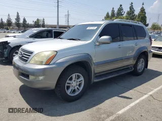 2003 Lexus GX 470 z VIN JTJBT20X230014167, wystawiony jako Copart lot #59575195 z przebiegiem 281 055 mil mil oraz Czysty tytuł • Clean title. Historia ofert i sprzedaży dostępna na DreamBid. Obrazek 1.